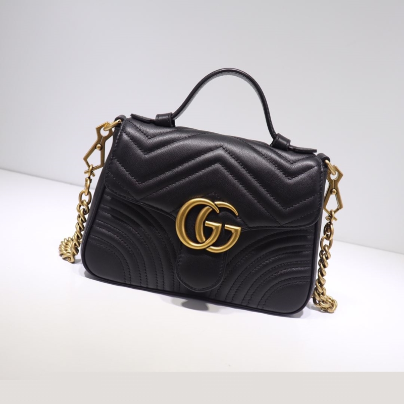 G*u*i top handle bags